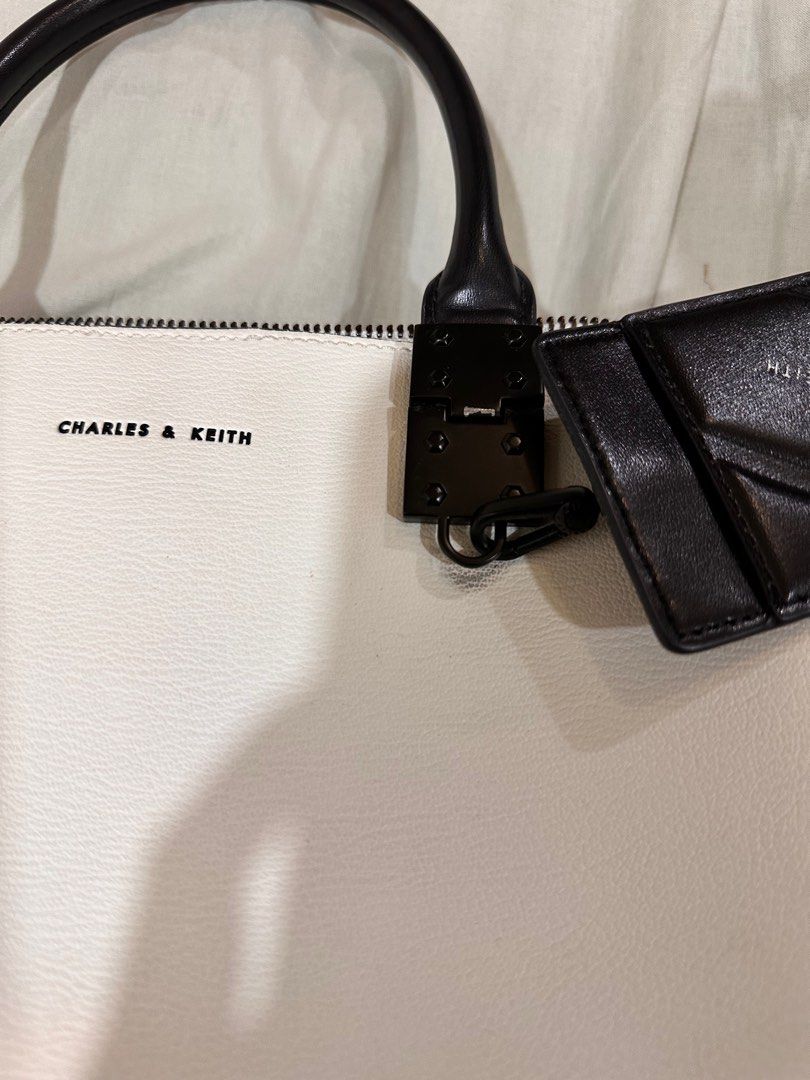 Charles & Keith Bag - Cameron Double Top Handle Bag - White (Category: Shoulder Bags) located in Pasig City. Submitted by margacee (Listing ID 1373464110, Image 3). Description: with minimal discoloration + sf Loc: Pasig .