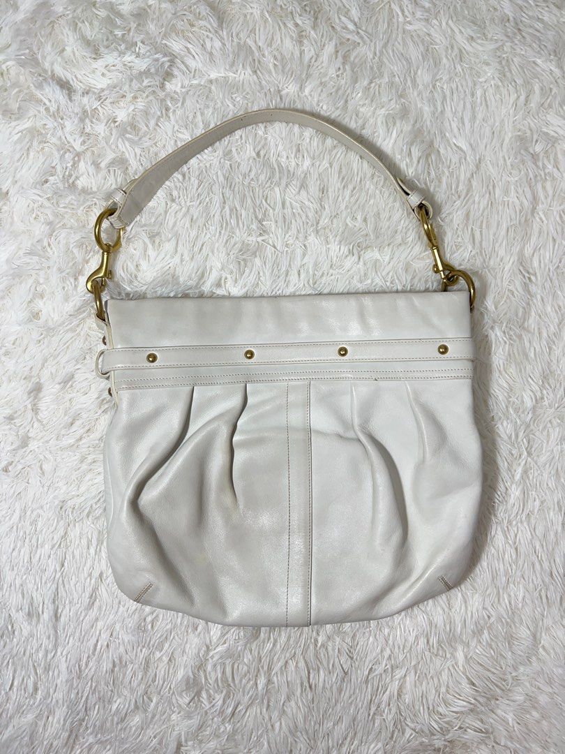 coach hampton hobo bag (Category: Luxury Bags & Wallets) located in San Fernando. Submitted by curatedfinds_ (Listing ID 1373424103, Image 2). Description: auth vintage condition: 7.5/10 dimension: approximately 12 x 13.5 inches minimal dirts (wipe out is the key 🔑) +normal scratches sa hardware bc of the hook overall good condition and rare find!.