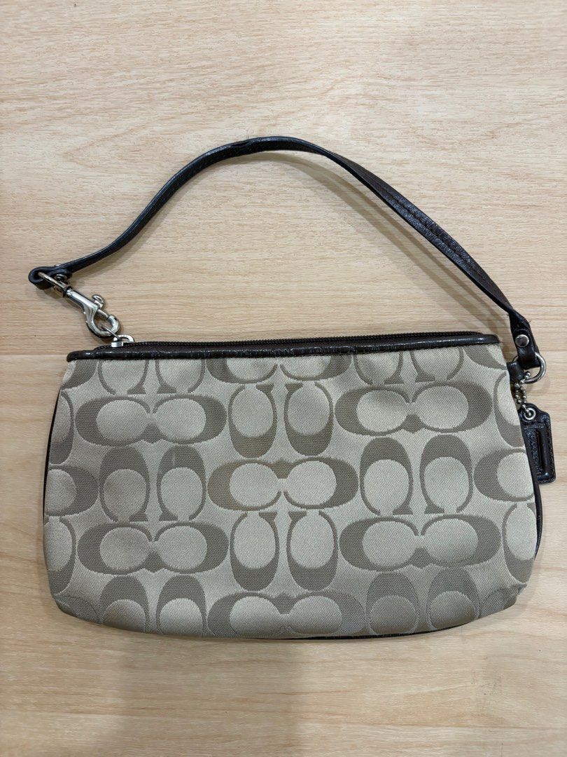 Coach Wristlet Pouch (Category: Bags & Wallets) located in Singapore. Submitted by octobercollection (Listing ID 1373516006, Image 2). Description: like 80% new no box no dust bag Go market can use .