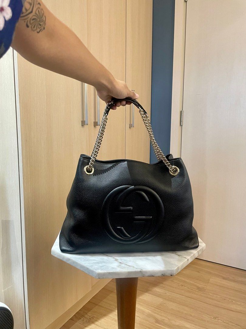 Gucci Black Pebbled Leather Medium Soho Tote (Category: Luxury Bags & Wallets) located in Pasig City. Submitted by i1basa (Listing ID 1373483846, Image 2). Description: Gucci Black Pebbled Leather Medium Soho Tote Selling for very very very low Bought in Japan Used twice Location: Pasig 100% authentic Preloved but in great condition (used twice) Comes with original dustbag and care card Keywords: Gucci Soho tote, black leather Gucci bag, Gucci Ja