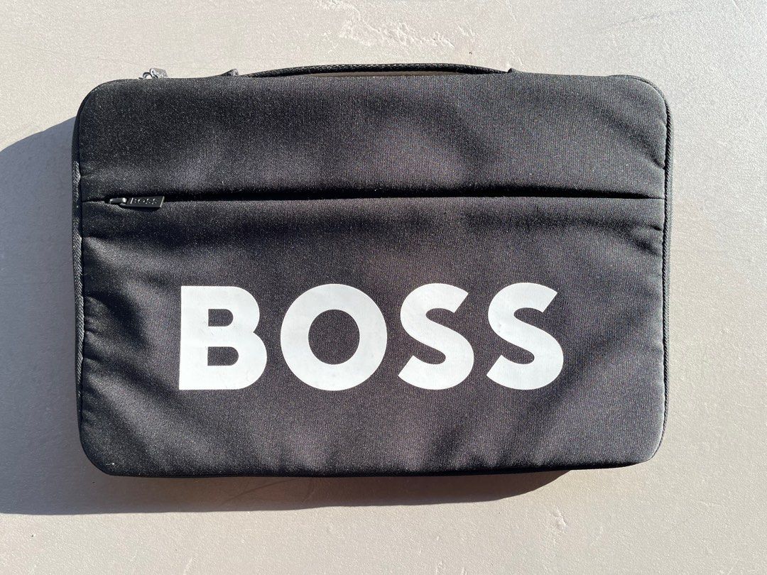 Hugo Boss Laptop Sleeve (Category: Laptop Bags & Sleeves) located in Singapore. Submitted by dncrwz (Listing ID 1373398551, Image 1). Description: In good condition, for small to medium office laptops. PM me for more info :D.