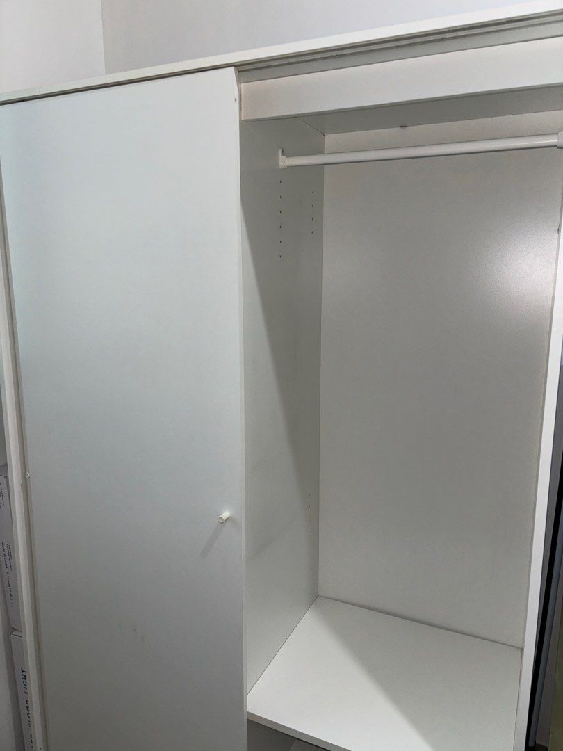 IKEA Kleppstad White Wardrobe Cabinet (Category: Shelves, Cabinets & Racks) located in Taguig. Submitted by fromtheroots (Listing ID 1373519884, Image 3). Description: • RFS: Moving out of dorm! • Used by 2 girls, can assure cleanliness 😊💖 No stains, see last photo for minor wood chip inside the closet (right side) • Bought online from IKEA for Php 9000 • For pick-up only at Vista 309 Katipunan, Quezon City.