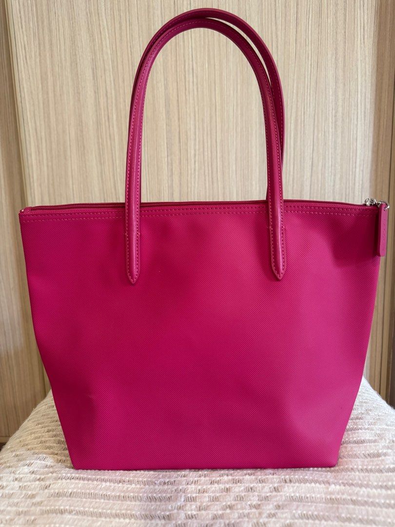 Lacoste Mini Shopper bag (Category: Luxury Bags & Wallets) located in Quezon City. Submitted by thrift.manila (Listing ID 1373426737, Image 2). Description: Used VERY lightly 10/10 condition Very spacious, similar to goyard mini Anjou Has zipper also.