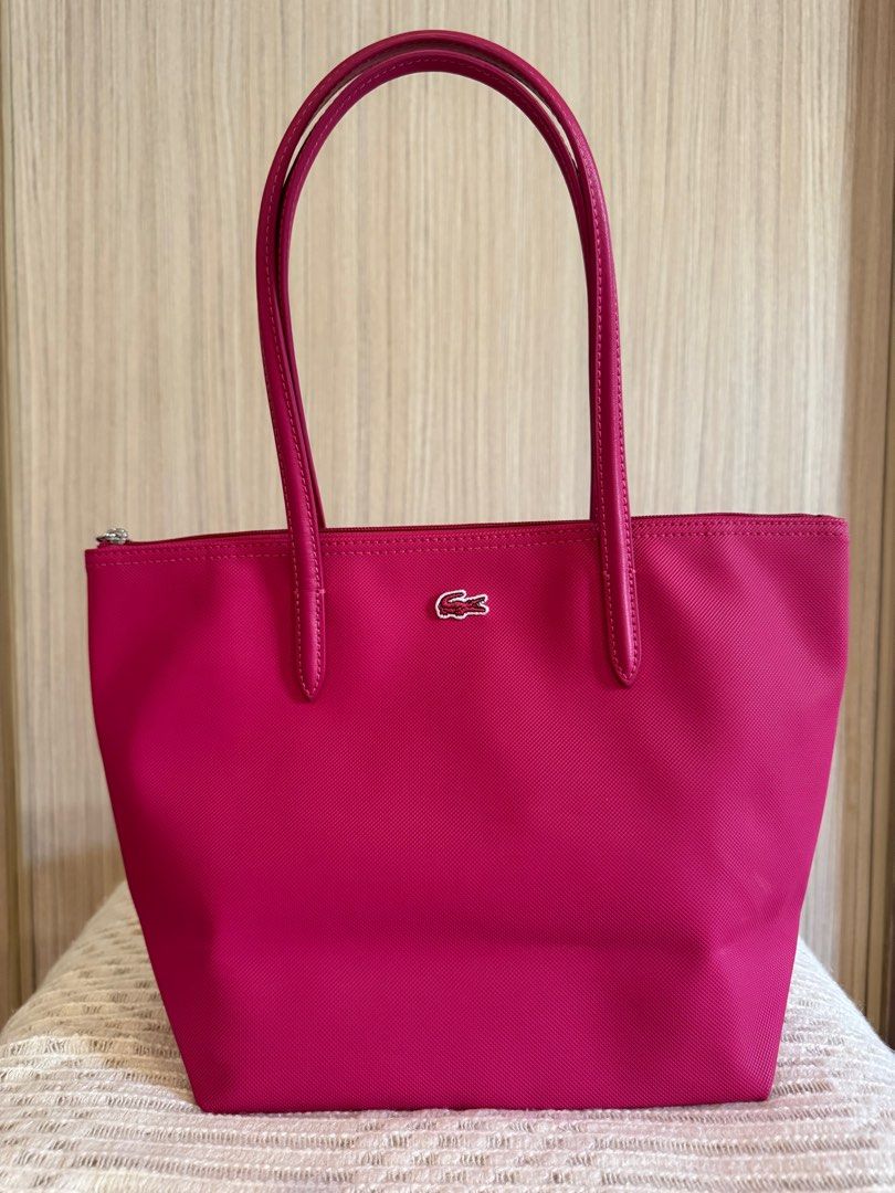 Lacoste Mini Shopper bag (Category: Luxury Bags & Wallets) located in Quezon City. Submitted by thrift.manila (Listing ID 1373426737, Image 1). Description: Used VERY lightly 10/10 condition Very spacious, similar to goyard mini Anjou Has zipper also.