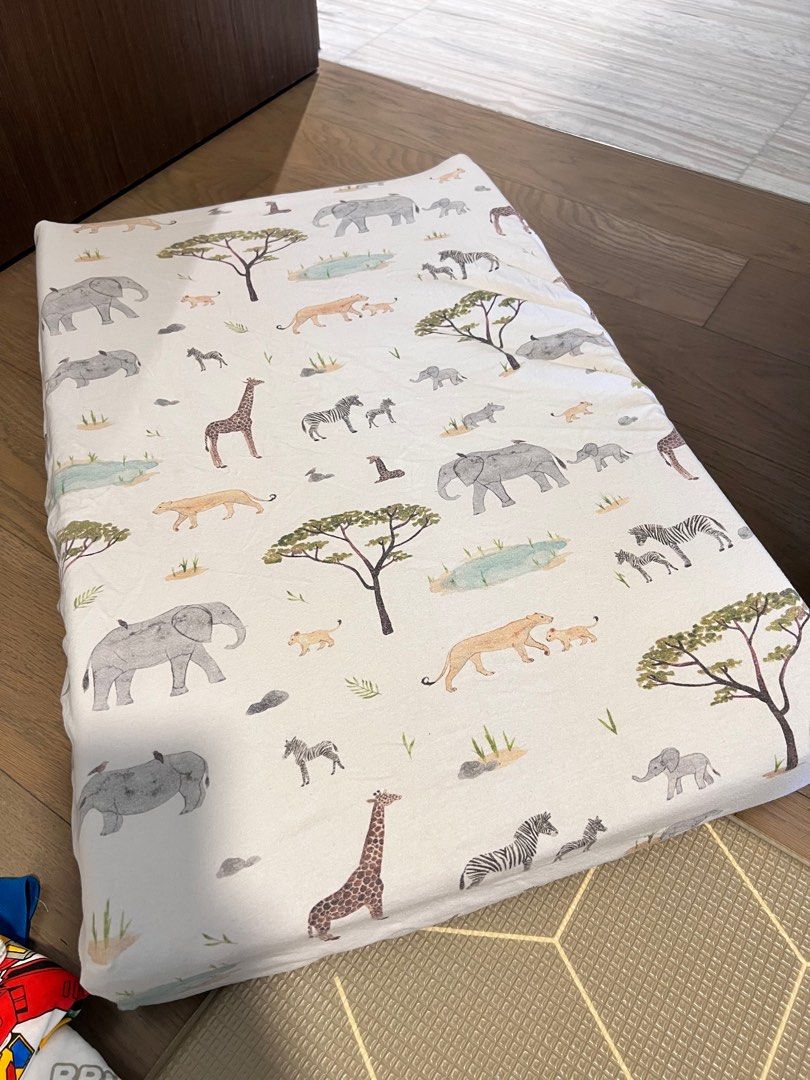 Mothercare changing table with covers (Category: Changing Tables & Stations) located in Singapore. Submitted by cherrier (Listing ID 1373426101, Image 2). Description: 100% cotton covers to switch around Two covers from snuggle hunny (organic cotton) One cover from Mothercare .