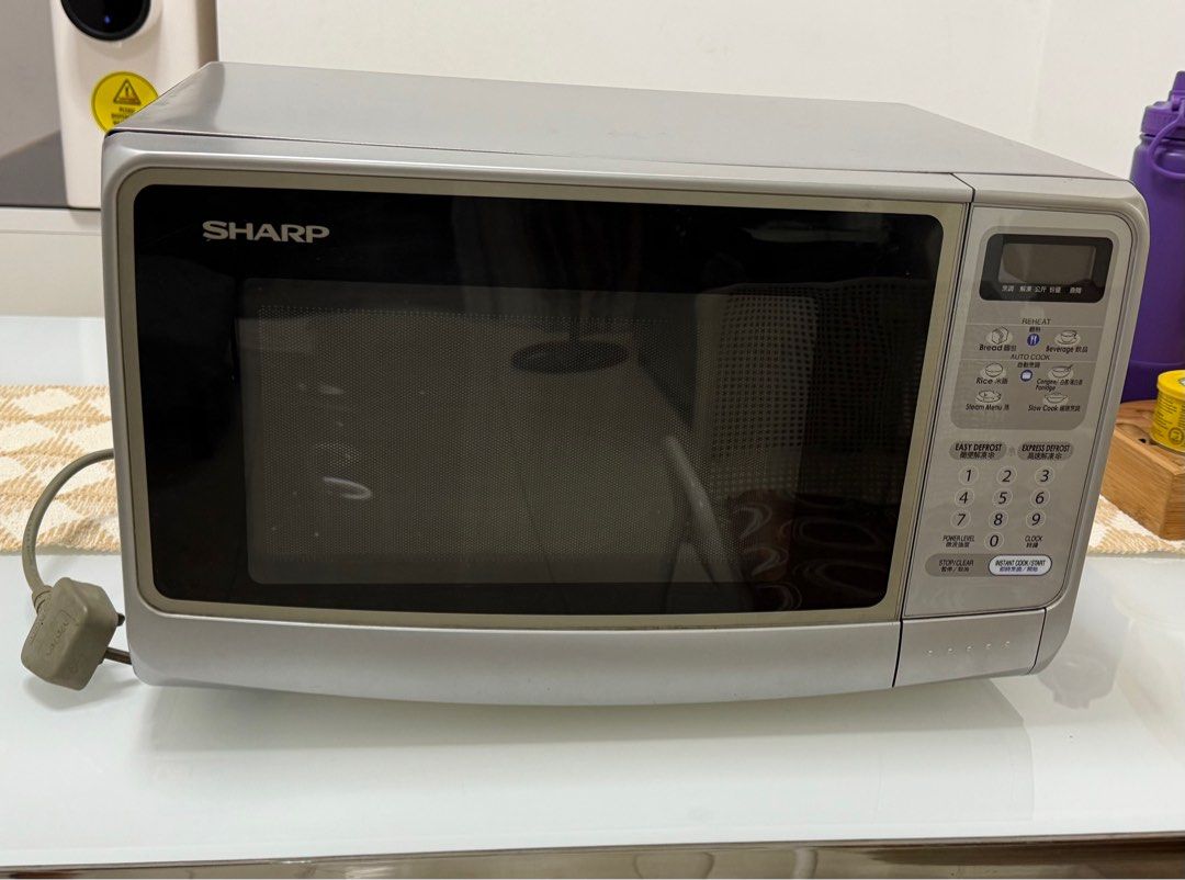 Sharp Microwave (Category: Ovens & Toasters) located in Singapore. Submitted by ytnpgm33l (Listing ID 1373515695, Image 1). Description: Sharp Microwave.
