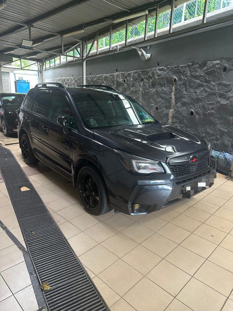 Subaru Forester 2.0A XT Auto (Category: Used Cars) located in Singapore. Submitted by hhhghhhhhhh (Listing ID 1373471243, Image 3). Description: NO CONSIGNMENT. Charge pipe, turbo inlet pipe, open pod, GFB BOV, Cusco strut bar, front and rear under anti roll bar, SS Brake Hose, SS diode Fog Lamp, and all necessary cooling upgrades done. Original Rays 57 Wheels. .