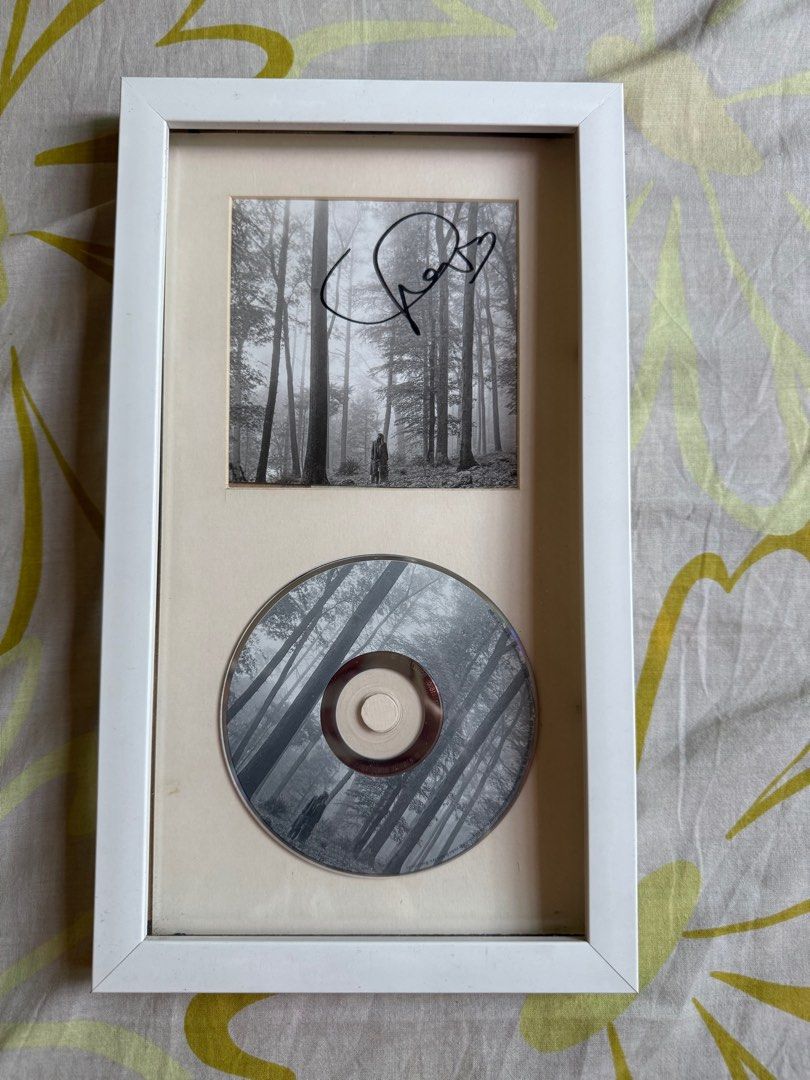 Taylor Swift folklore signed CD unsealed with frame included (Category: CDs & DVDs) located in Manila. Submitted by thenextdoorapparel (Listing ID 1373572776, Image 2). Description: -unsealed -good condition - includes frame.