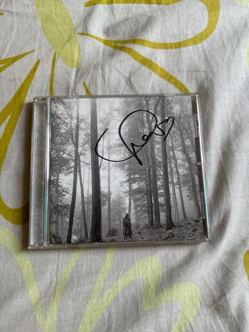 Taylor Swift folklore signed CD unsealed with frame included (Category: CDs & DVDs) located in Manila. Submitted by thenextdoorapparel (Listing ID 1373572776, Image 1). Description: -unsealed -good condition - includes frame.