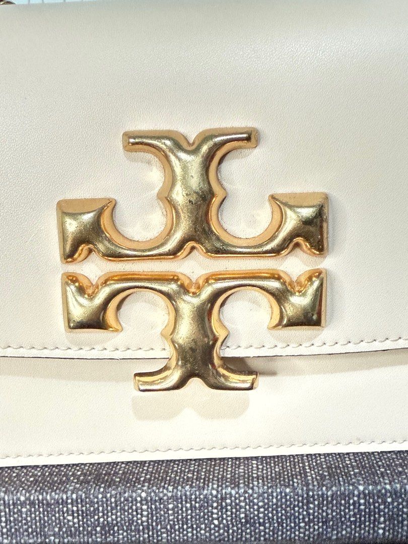 TORY BURCH ELEANOR (Category: Luxury Bags & Wallets) located in Dagupan City. Submitted by luckyluxbyemgee (Listing ID 1373505227, Image 3). Description: Authentic or moneyback 100% Preloved item Condition 8/10 Size: Small Convertible Shoulder Bag Color: Ivory / New Cream Retail Price 30kplus RFS: declutterring Inlusion: bag and dustbag .
