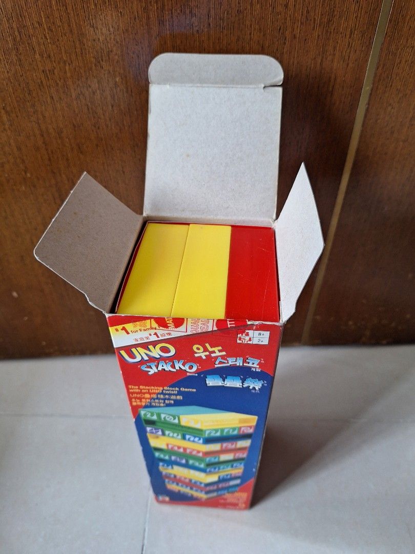 UNO STACKO (Category: Board Games & Puzzles) located in Singapore. Submitted by all_must_go_sale (Listing ID 1373406810, Image 3). Description: The stacking block game with an UNO twist for family fun. Self Collection at Hougang ave 8. No exchange, return or refund. Thanks for viewing..