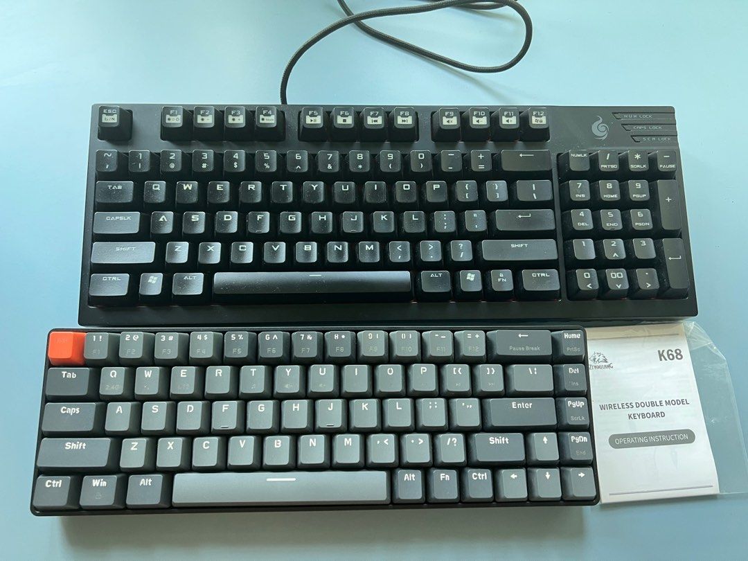 2 mechanical keyboards (Category: Computer Keyboard) located in Singapore. Submitted by dmc_kira.cues (Listing ID 1373620778, Image 1). Description: 1 coolermaster quick fire tk and 1 k68 wireless keyboard Both are silent switches.