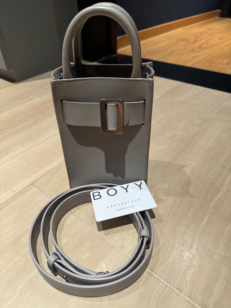 Authentic Boyy Tourist Gray Kalamata (Category: Luxury Bags & Wallets) located in Quezon City. Submitted by breakmyfashion (Listing ID 1373623376, Image 1). Description: Comes with card. Very lightly used, still good as new. Excellent condition, no scratches. Bag comes with detachable strap. Can be carried with its handles or crossbody with strap. Retail Price: $1,129 (₱65,000) Product details: Palmellato calfskin mini rectangular leather handbag