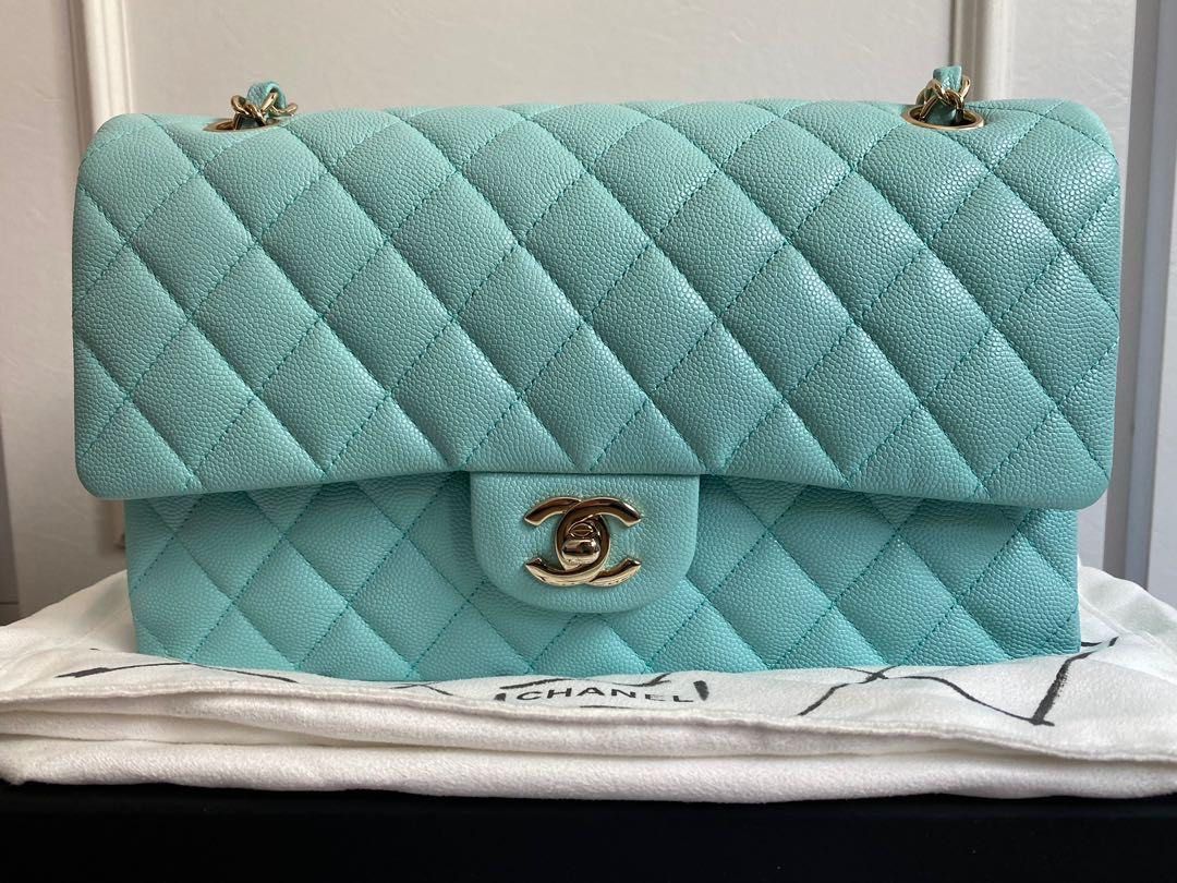 Authentic Chanel Classic Medium Caviar Tiffany Blue 19C Flap (Category: Luxury Bags & Wallets) located in Quezon City. Submitted by breakmyfashion (Listing ID 1373650269, Image 1). Description: As good as new. Used for less than 5 times. Pretty color against the LGHW. Comes in full set with receipt, authenticity card, box, paperbag and dust bag. .
