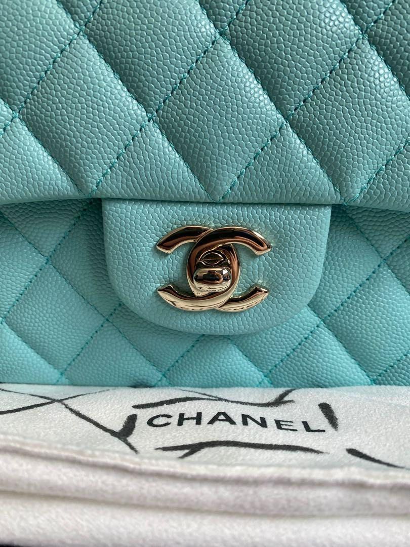 Authentic Chanel Classic Medium Caviar Tiffany Blue 19C Flap (Category: Luxury Bags & Wallets) located in Quezon City. Submitted by breakmyfashion (Listing ID 1373650269, Image 2). Description: As good as new. Used for less than 5 times. Pretty color against the LGHW. Comes in full set with receipt, authenticity card, box, paperbag and dust bag. .