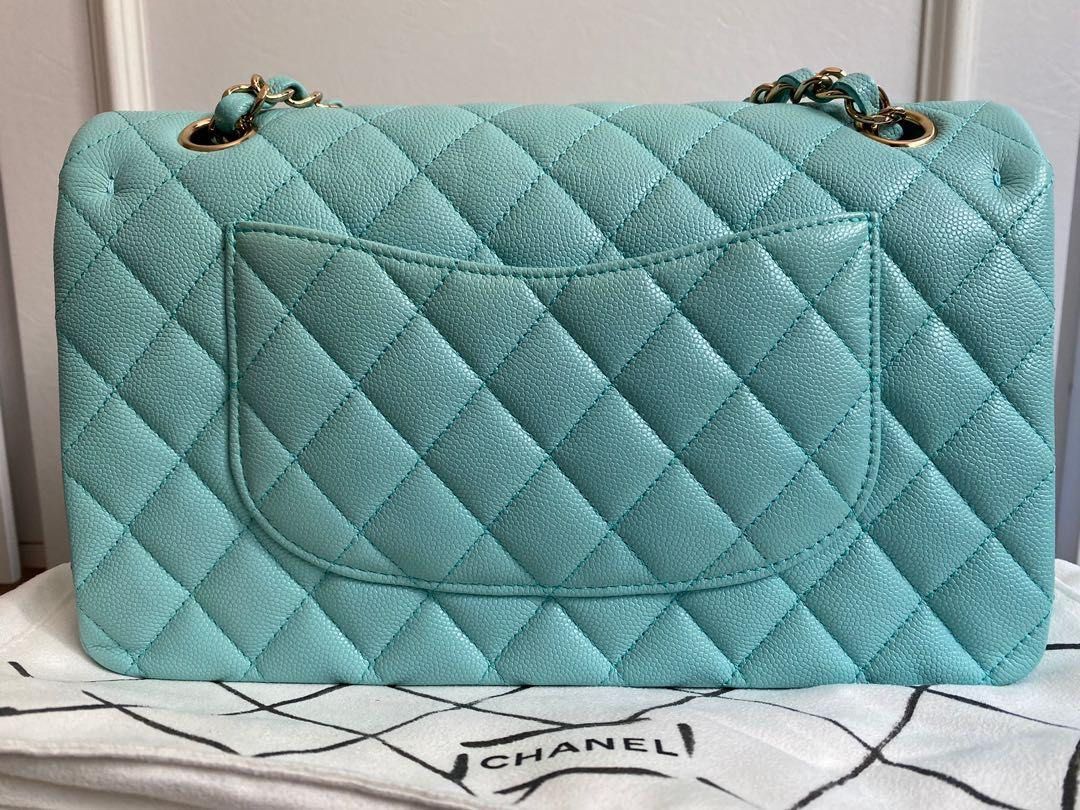 Authentic Chanel Classic Medium Caviar Tiffany Blue 19C Flap (Category: Luxury Bags & Wallets) located in Quezon City. Submitted by breakmyfashion (Listing ID 1373650269, Image 3). Description: As good as new. Used for less than 5 times. Pretty color against the LGHW. Comes in full set with receipt, authenticity card, box, paperbag and dust bag. .
