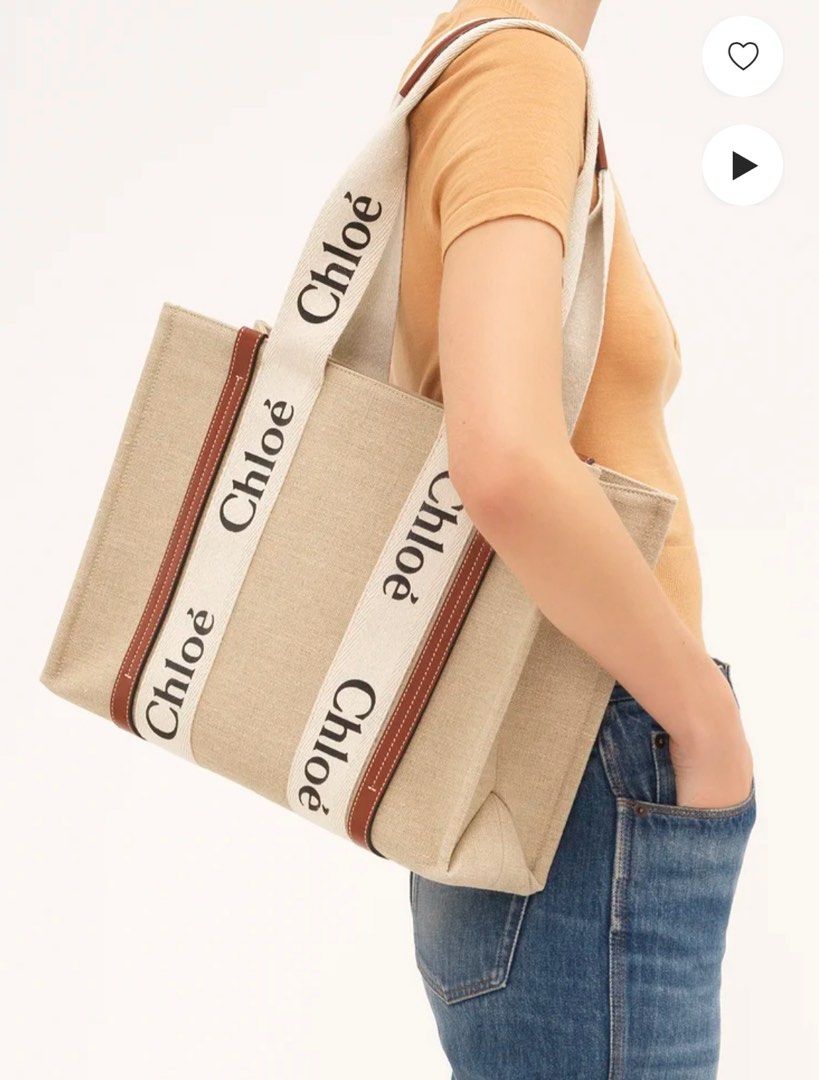 Authentic Chloe WOODY TOTE BAG IN LINEN (Category: Bags & Wallets) located in Singapore. Submitted by thebaglover (Listing ID 1373598037, Image 1). Description: Tote bag in linen canvas & shiny calfskin with Chloé logo Main material: Linen Secondary material: Calfskin Trim: Polyester Carry: Short shoulder & hand - 2 long handles - 1 spacious main compartment - 1 internal flat pocket Comes with a dust bag - Width: 14.6” (37 cm) - Height: 10.2” (26