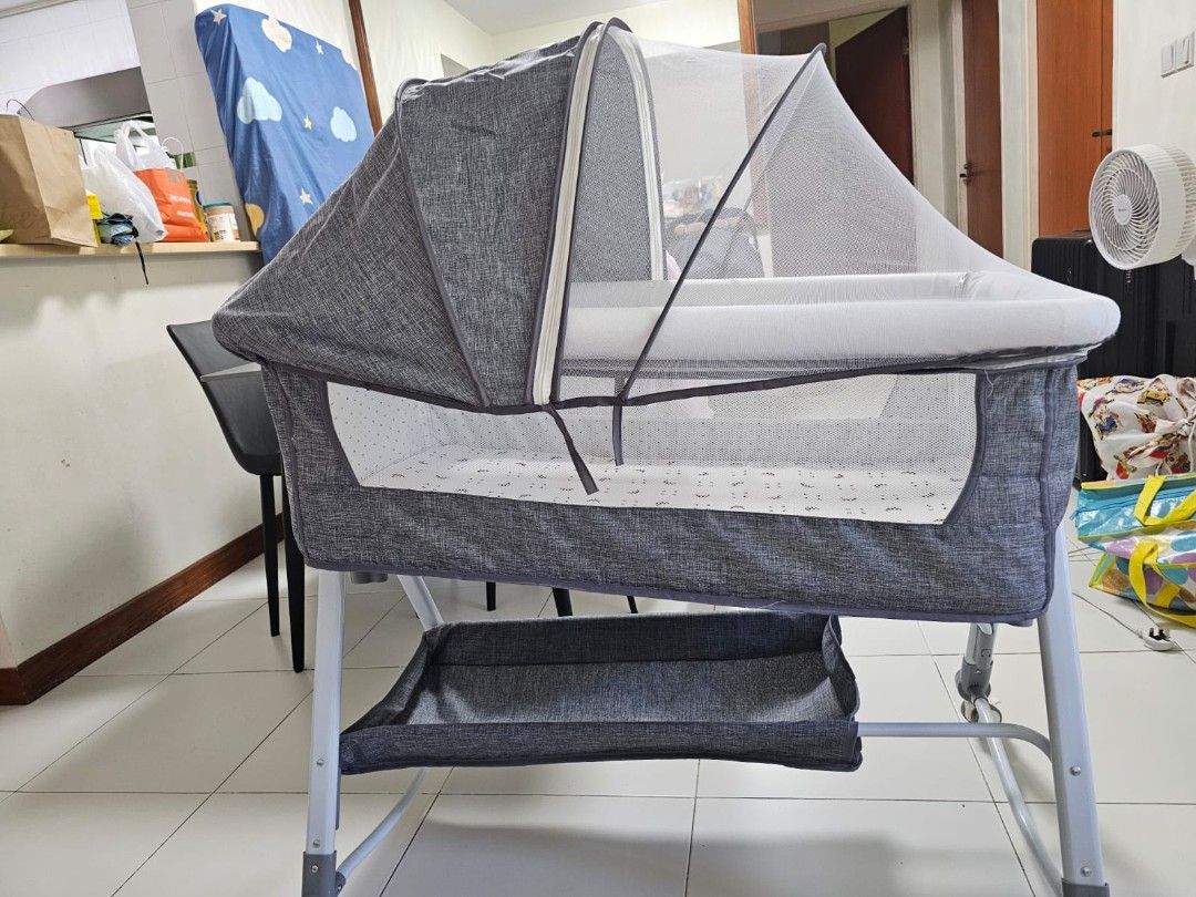 Baby Cot, Baby Swinger and Baby Sleeping Pod (Category: Cots & Cribs) located in Singapore. Submitted by iron_kick (Listing ID 1373597359, Image 1). Description: Lightly used adjustable baby crib,Clevamama sleeping pod,3 in 1 baby rocker.For new 0-9months old.Selling because my daughter growth. All items' original price more than 350SGD..