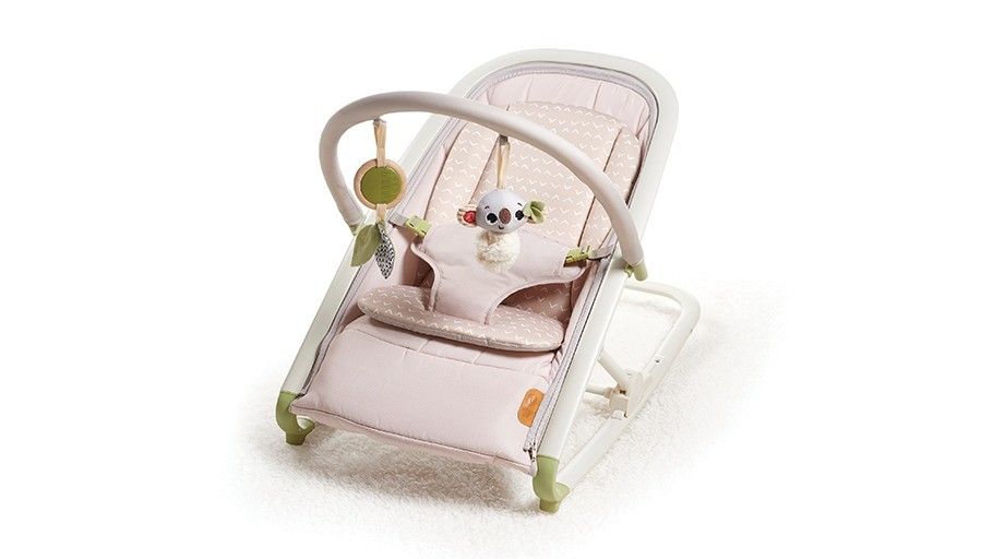 Tiny Love Baby Infant Newborn Rocker Bouncer Bed (Category: Cots & Cribs) located in Singapore. Submitted by juan_boutique (Listing ID 1373645042, Image 1). Description: Used in good condition. Do note that cracks are visible on the sides of the toys arch hence selling cheap. 2 adorable developmental toys: plush koala and wooden rattle with crinkly leaves Toy arch is removable Cozy inlay for newborns 3 reclining positions: easy shift with one han