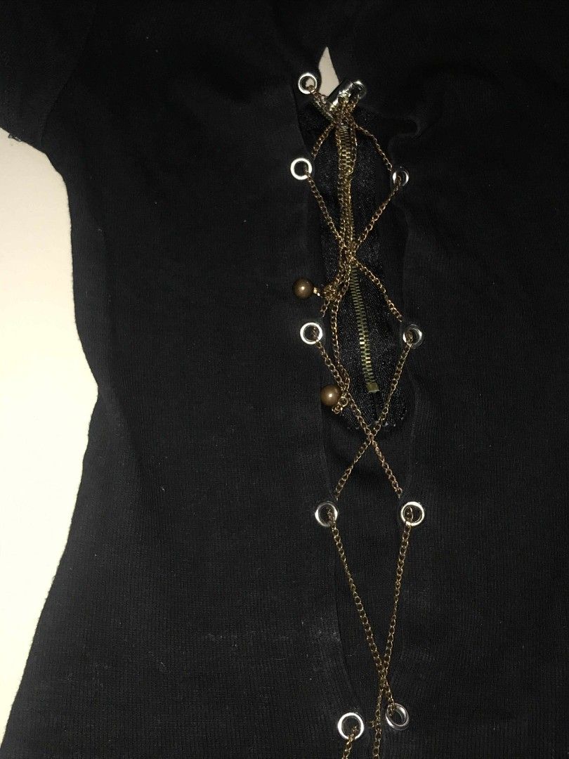 Black backless top (Category: Shirts) located in Iloilo. Submitted by clairo_crib (Listing ID 1373642992, Image 1). Description: Never been worm statement top✨ Xs-Semi-med (Stretchable) MOP: Gcash/BPI MOD: Jnt.