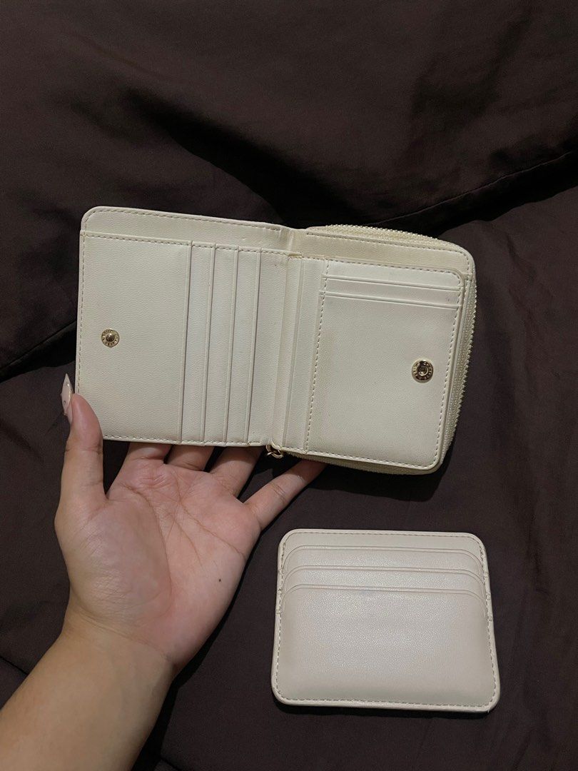 Charles & Keith Original Buy 1 take 1 (Category: Wallets & Card holders) located in Quezon City. Submitted by mthings (Listing ID 1373710613, Image 2). Description: Buy 1 take 1 - needs wash lang but all goods lahat.