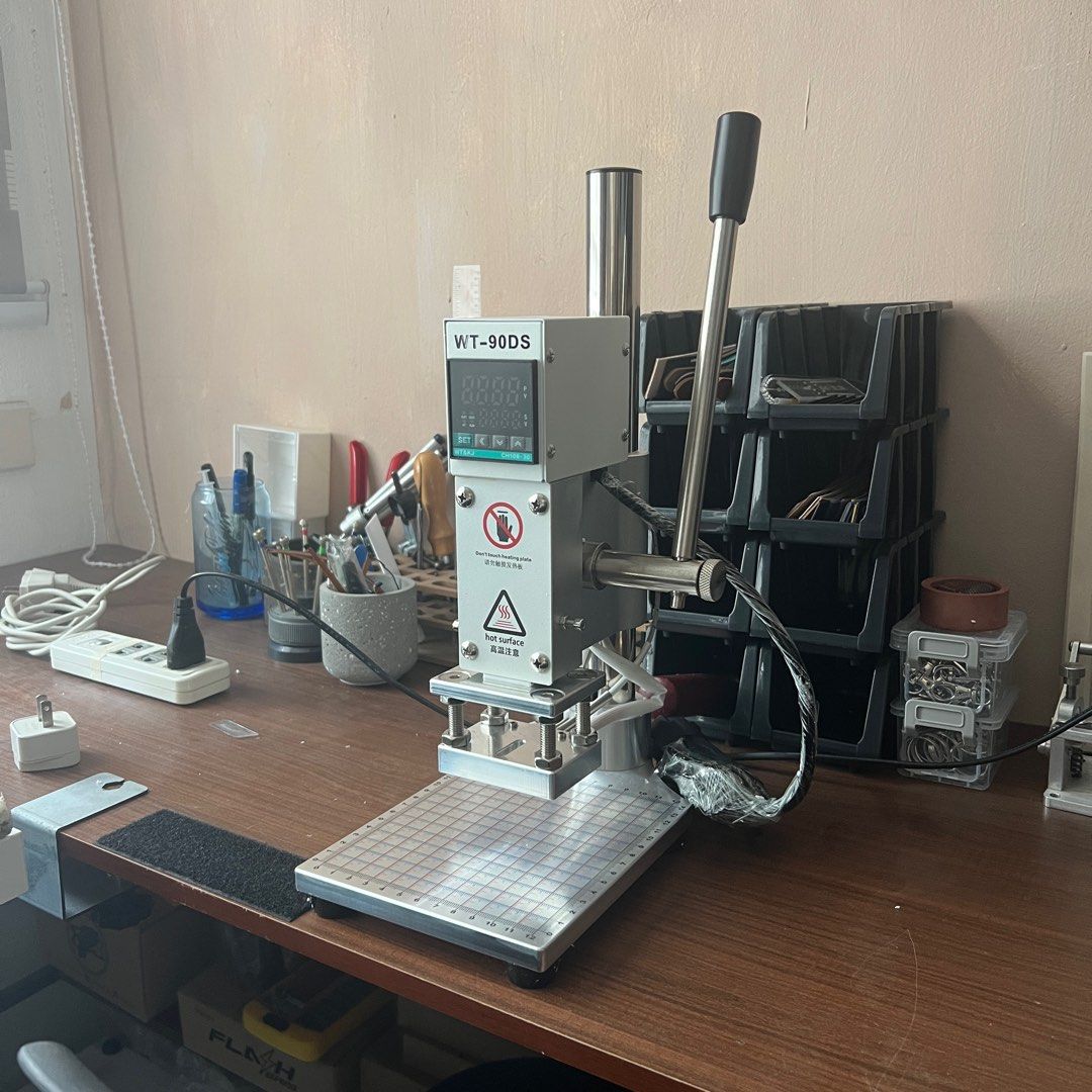 CHEAPEST Hot Stamping Machine (Category: Everything Else Others) located in Las Pinas. Submitted by frewx (Listing ID 1373663478, Image 2). Description: Leather Embossing Foil Heat Press Machine Small Manual Digital Hot Stamping Machine for Wood PVC Paper Custom Logo Stamp Heating Plate 5*7cm Digital display thermostat Monitor real-time temperature; Set a constant temperature; Easy to control No alphabet, number stamp included Brand new! Location