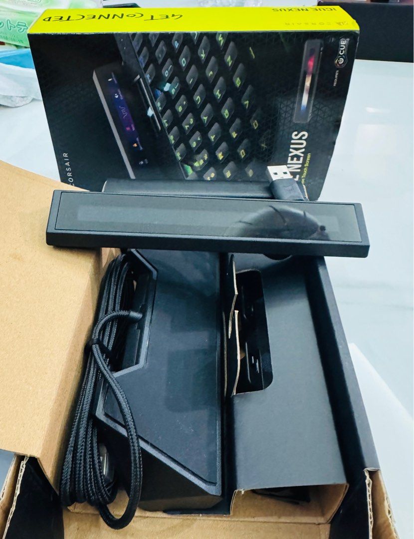 🖥️CORSAIR ICUE NEXUS🖥️ (Category: Computer Parts) located in Singapore. Submitted by bafanglaicai888 (Listing ID 1373661426, Image 2). Description: Received it as a gift, hence selling. Usage : 1 month Condition: 9/10 Full set comes with box ------------------------------------------------ • 5-inch touch screen with up to 6 virtual buttons per screen • Customizable widgets to monitor system stats (CPU/GPU temps, fan speeds, etc.) • Macro suppor