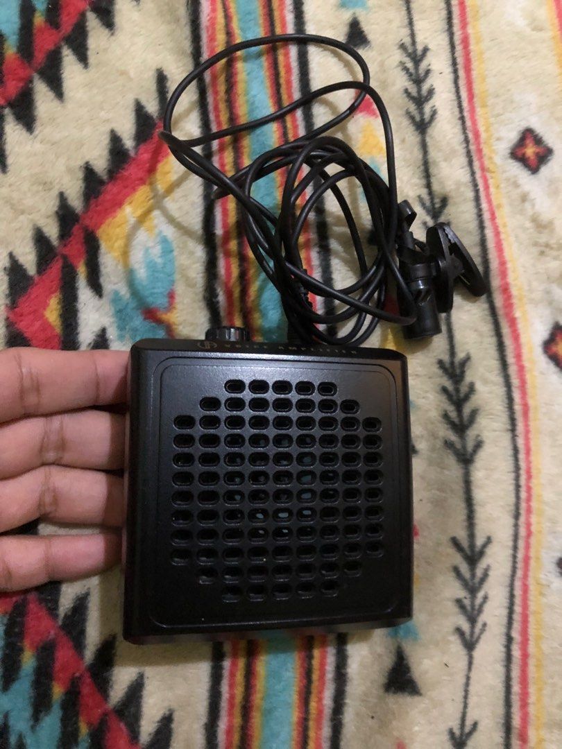 Defective spokeman voice amplifier (Category: Portable Audio Accessories) located in Quezon City. Submitted by markgolveo (Listing ID 1373658133, Image 1). Description: Defective spokeman voice amplifier Tested with power Issue: When volume is turned high it just makes loud humming noise Missing one battery cover For parts out repairs .