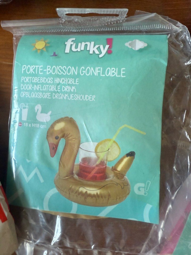 Fun floaties (Category: Kids Toys) located in Singapore. Submitted by onehappyplace (Listing ID 1373616281, Image 2). Description: Different kind of floaties for drinks, fun, and vibe. 4 pieces. New never used. Bundle buy Shark (dimensions in the pic) Pillow Drink holders donut and swan x2.