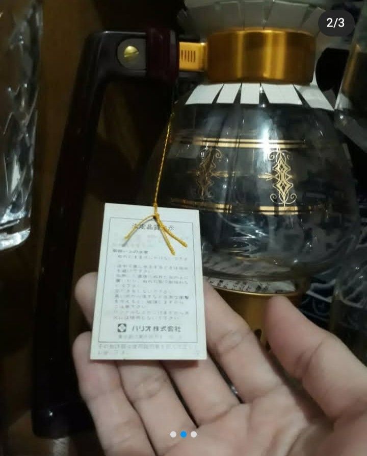 Glass Coffee Syphon Coffee Maker (Category: Coffee & Tea Tableware) located in Mandaluyong City. Submitted by ehrgeee (Listing ID 1373637790, Image 2). Description: Brand new without box. I already disposed the box since it is already deformed. Never been used. It has been stored inside the display cabinet. Complete with scoop accessories for coffee and tag. Made in Japan..