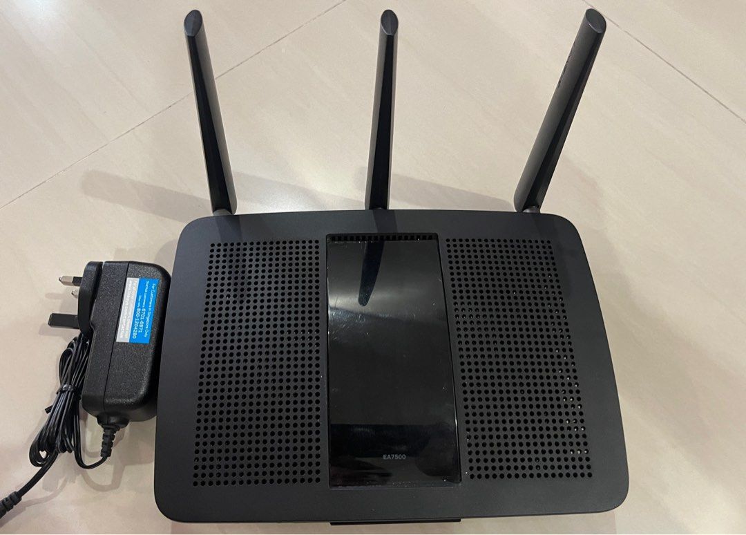 Linksys Router EA7500 v2 (Category: Networking) located in Singapore. Submitted by sim_tj (Listing ID 1373618893, Image 1). Description: The Linksys EA7500 v2 is a dual-band AC1900 router that supports both 2.4 GHz and 5 GHz frequencies, offering a maximum combined throughput of 1900 Mbps. It utilizes MU-MIMO technology and has a 1.4 GHz dual-core processor. The router supports various modes like router, bridge, and access point, and comes with t