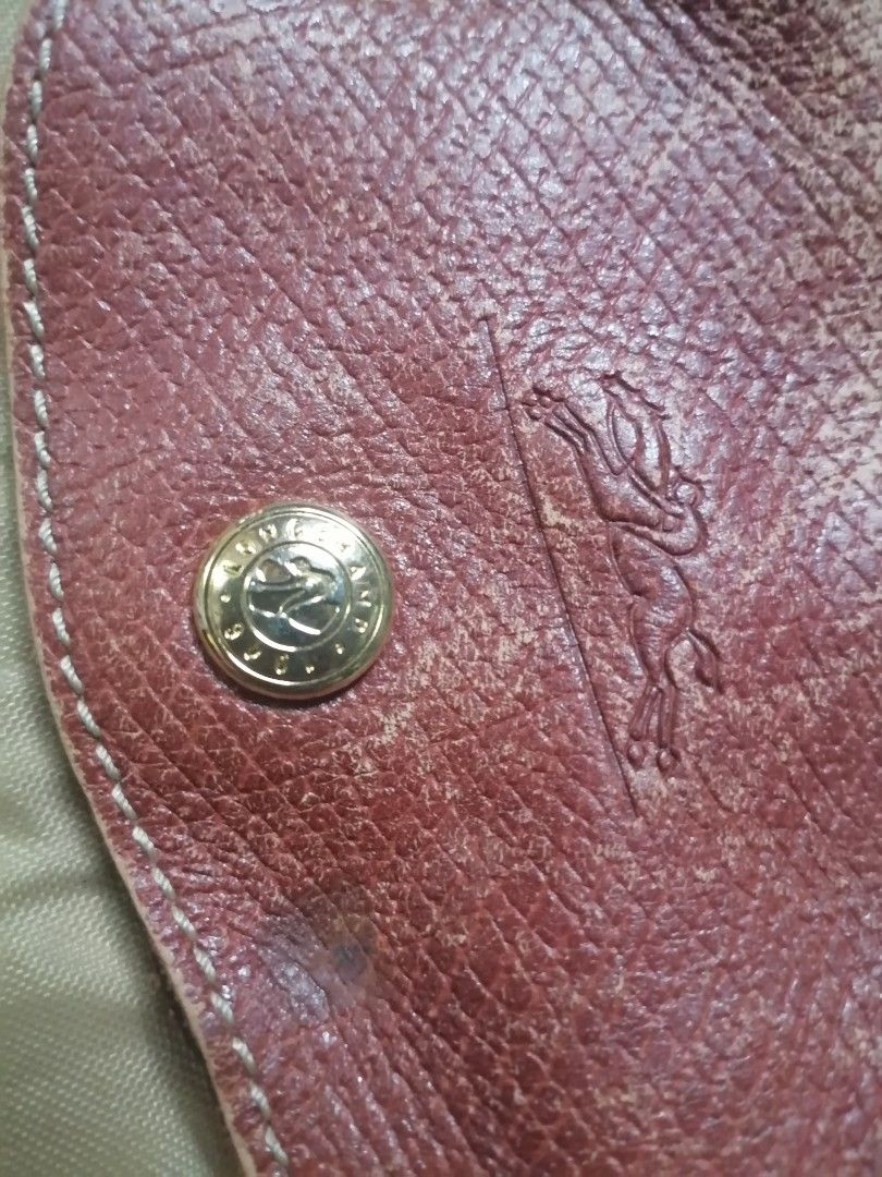 Longchamp document bag (Category: Luxury Bags & Wallets) located in Cagayan de Oro. Submitted by emma3782 (Listing ID 1373664821, Image 3). Description: Needs professional cleaning and Iron No hole or rips Only sign of usage Dimensions: 13" h 16" w 3" base 2" handle.