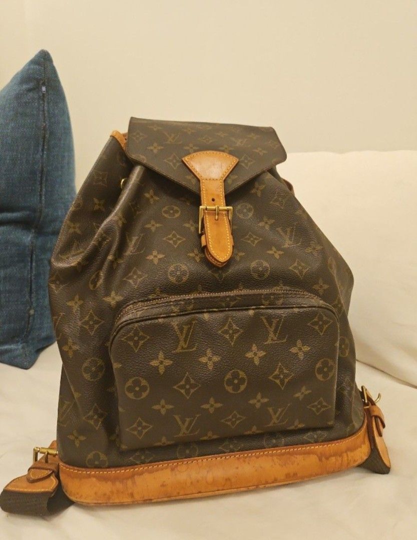 Louis vuitton vintage monogram bucket backpack (Category: Bags & Wallets) located in Singapore. Submitted by keeksell (Listing ID 1373681548, Image 1). Description: Nice patina in good condition aside from the drawstring broke (refer to last photo). if you send it to a bag spa they can replace it for you Height: 36cm, width 31cm depth 13cm.