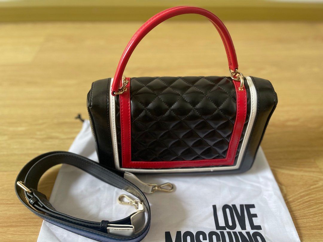 Moschino Multicolor Bag (Category: Bags & Wallets) located in Singapore. Submitted by blue08 (Listing ID 1373656391, Image 3). Description: Multicolor Bag or handbag with detachable adjustable strap. Used once only .. Authentic Brought to Premiummall sg. Comes with dust bag ☺️ can nego ..