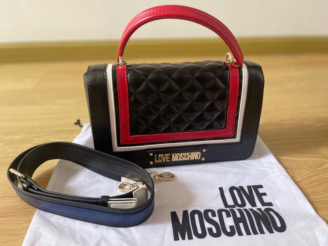 Moschino Multicolor Bag (Category: Bags & Wallets) located in Singapore. Submitted by blue08 (Listing ID 1373656391, Image 2). Description: Multicolor Bag or handbag with detachable adjustable strap. Used once only .. Authentic Brought to Premiummall sg. Comes with dust bag ☺️ can nego ..
