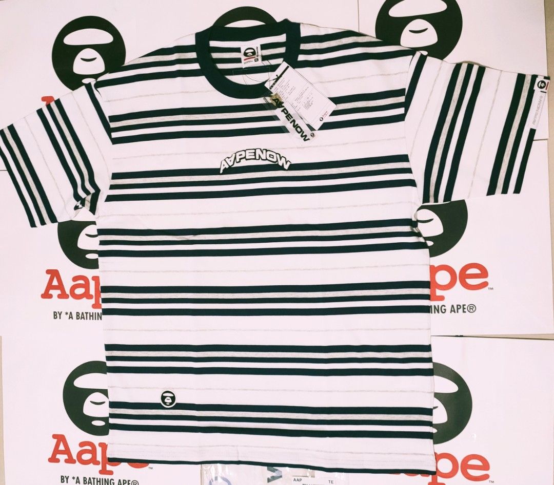 *NEAT* Aape BY *A BATHING APE® AAPE NOW Striped Tshirt White AAPTEM1419XXMWHC (Category: Tshirts & Polo Shirts) located in Singapore. Submitted by nofrillsfactoryoutlet (Listing ID 1373683321, Image 7). Description: Usual : $115 SALE : $93 100% Authentic and Brand New with Tags and packaging. Direct from Aape BY *A BATHING APE® outlet in Beijing. Brand : Aape BY *A BATHING APE® Series : AAPE NOW Design : Striped Tshirt Colour : White / Multicolou