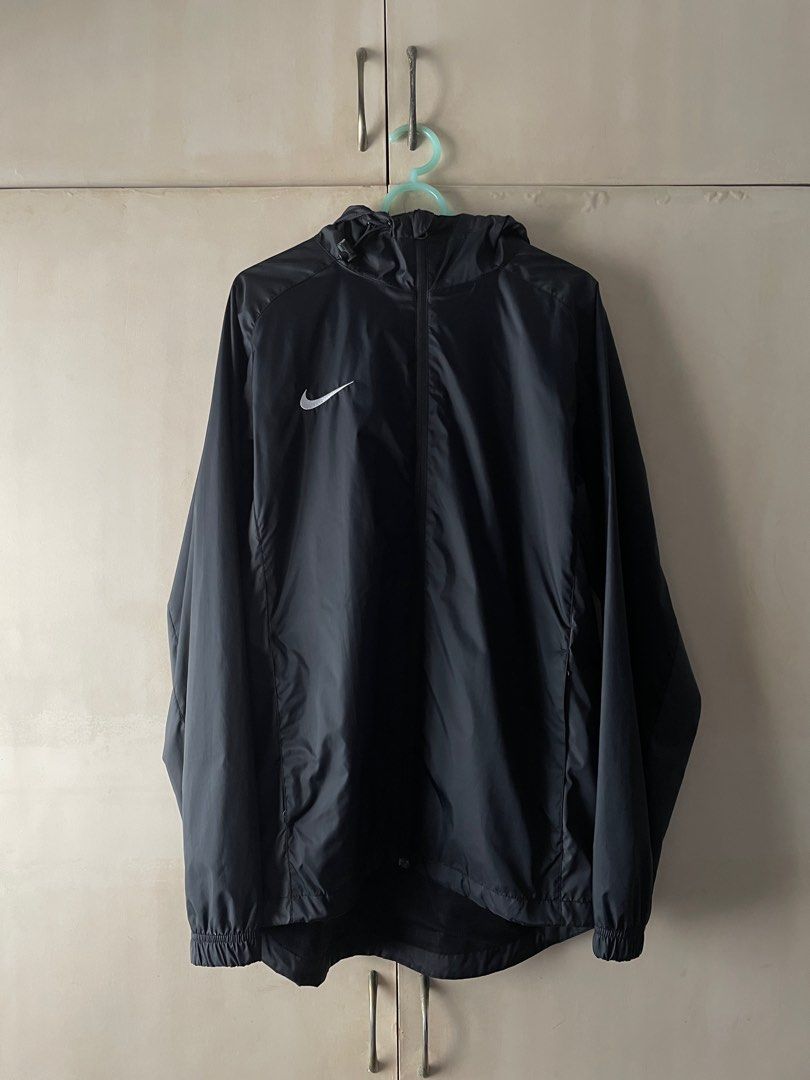 Nike Jacket - Black (Category: Coats, Jackets and Outerwear) located in Manila. Submitted by cloudsfloat (Listing ID 1373695128, Image 1). Description: Nike Football Jacket - Medium - Water repellant - With packable hood - Authentic, purchased in-store - Very good condition, barely used.