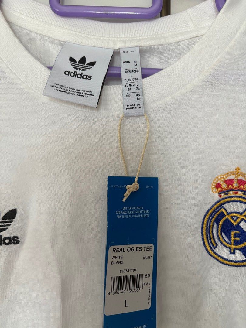 Real Madrid retro shirt (Category: Activewear) located in Singapore. Submitted by pelei (Listing ID 1373642407, Image 3). Description: Brand new Real Madrid retro shirt Adidas Original RM shirt Size L No trade .