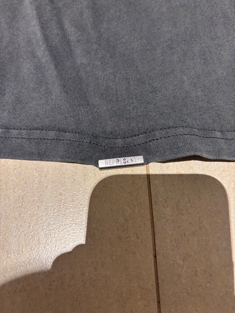 Represent Tee (Category: Tshirts & Polo Shirts) located in Singapore. Submitted by thefefe (Listing ID 1373597206, Image 3). Description: Size XS that fits 176cm Male. Tee is like new with no marks or signs of wear.