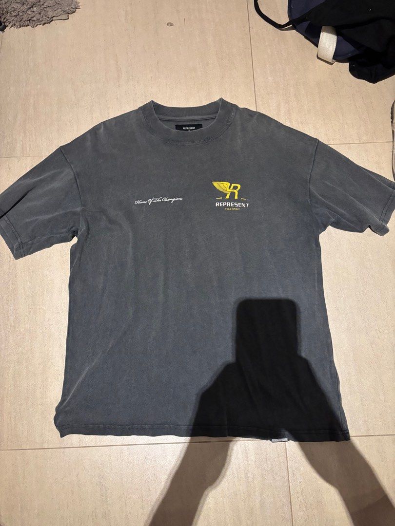 Represent Tee (Category: Tshirts & Polo Shirts) located in Singapore. Submitted by thefefe (Listing ID 1373597206, Image 1). Description: Size XS that fits 176cm Male. Tee is like new with no marks or signs of wear.