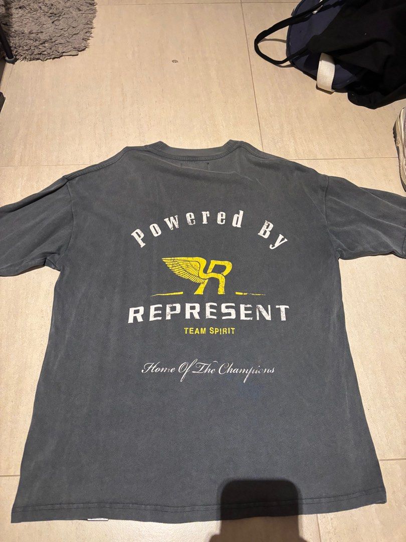 Represent Tee (Category: Tshirts & Polo Shirts) located in Singapore. Submitted by thefefe (Listing ID 1373597206, Image 2). Description: Size XS that fits 176cm Male. Tee is like new with no marks or signs of wear.