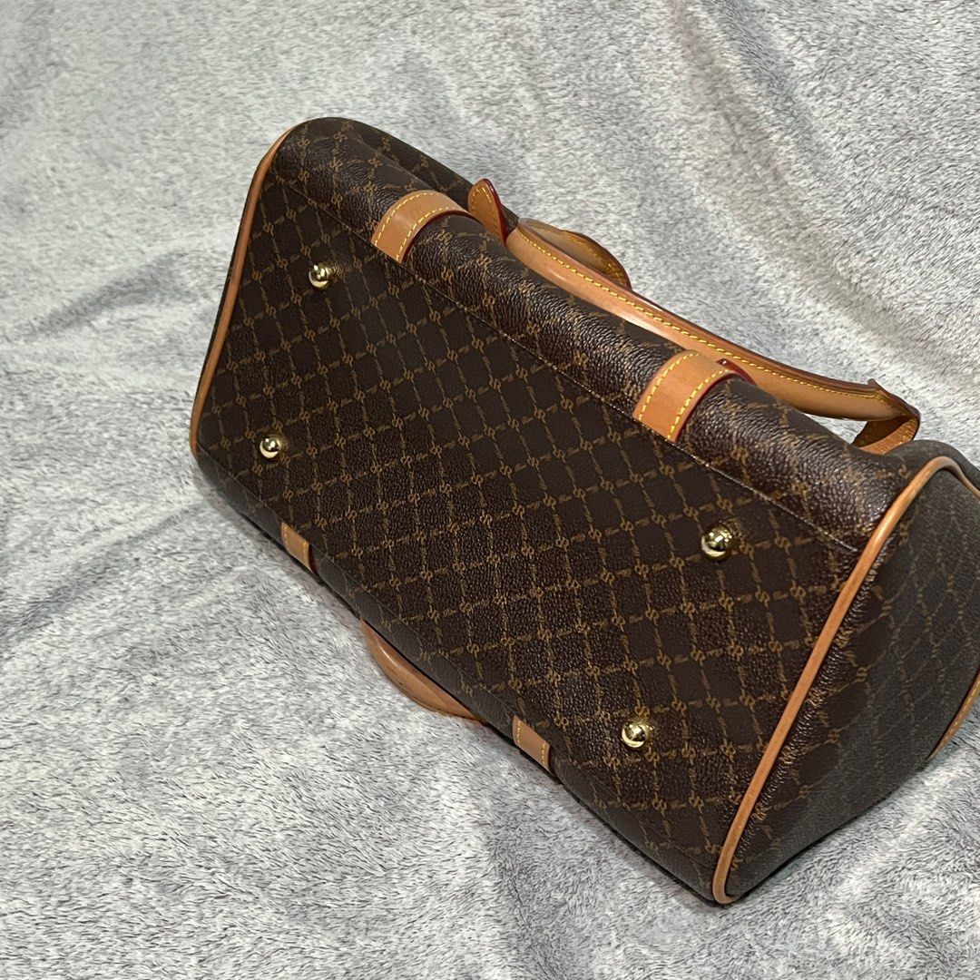 rioni the michigan carrier (Category: Luxury Bags & Wallets) located in Manila. Submitted by acxc01 (Listing ID 1373681833, Image 3). Description: ♡ premium rioni signature monogram canvas ♡ top zip closure for secure storage ♡ soft fabric-lined interior with multiple compartment ♡ timeless design – perfect for work, school, or travel.