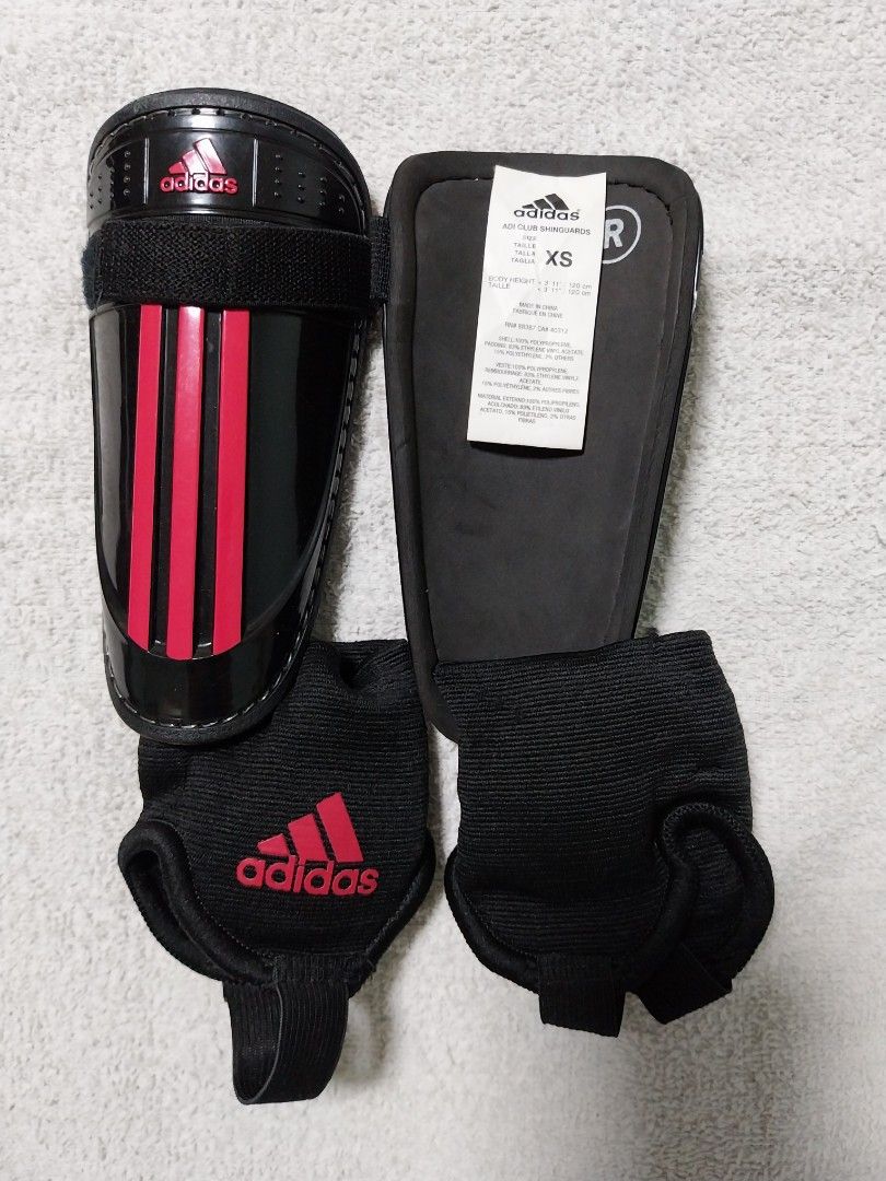 Soccer Shoes with shin guards (Category: Babies & Kids Fashion) located in Paranaque City. Submitted by shellatan21 (Listing ID 1373599854, Image 3). Description: shoe size 1.5 UK (2 US); includes 2 pairs of Adidas shin guards.