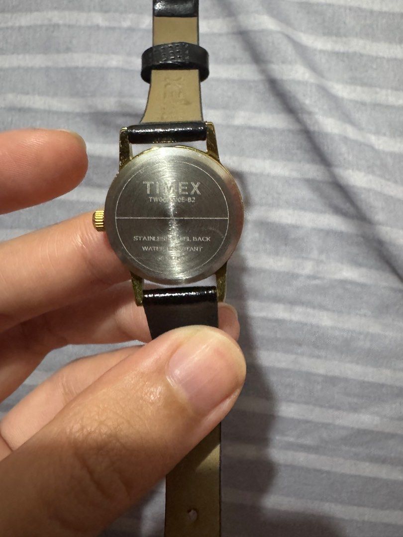 Timex Clasic Watch (Category: Women's Watches) located in Manila. Submitted by loopsyfruityy (Listing ID 1373759919, Image 2). Description: Pre-loved Timex analog wristwatch in nearly brand-new condition! Perfect for casual, office, or daily wear. ✔️ Model: TW2V500E-B2 ✔️ Minimalist white dial, gold-tone case ✔️ Black leather strap ✔️ Water Resistant (30m) ✔️ Quartz movement (battery operated) ✔️ Stainless steel back ✔️ Original condition, 100% w