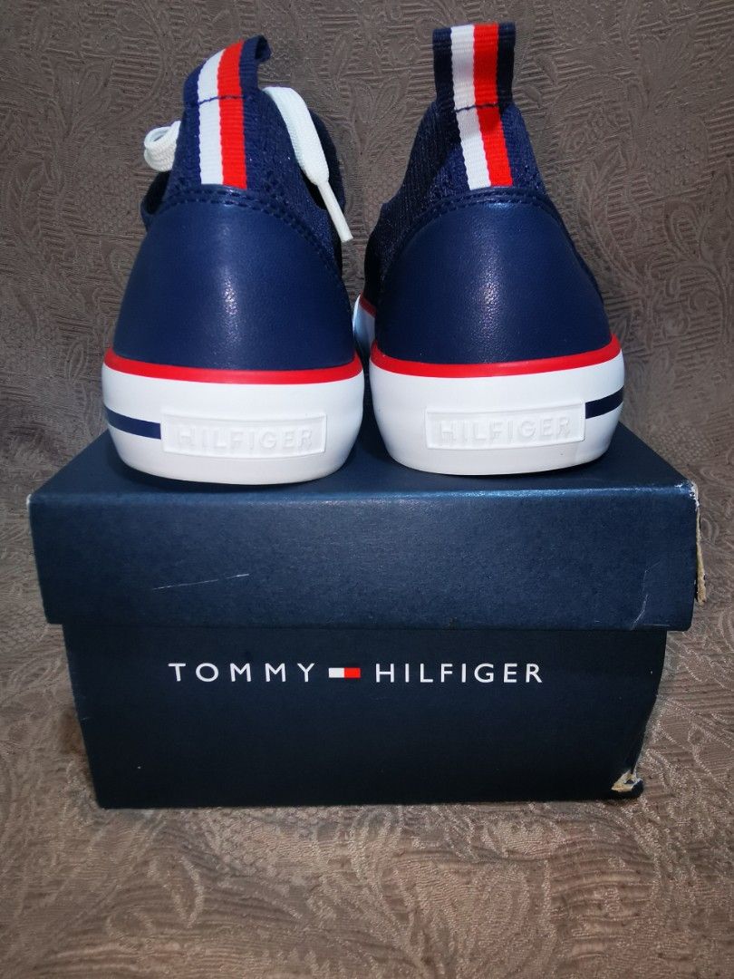 Tommy Hilfiger Sneakers (Category: Sneakers) located in Pasig City. Submitted by puggable (Listing ID 1373639737, Image 2). Description: BranD New Tomny Hilfiger Gessie in Dark Blue Fabric Women's size 6.5.