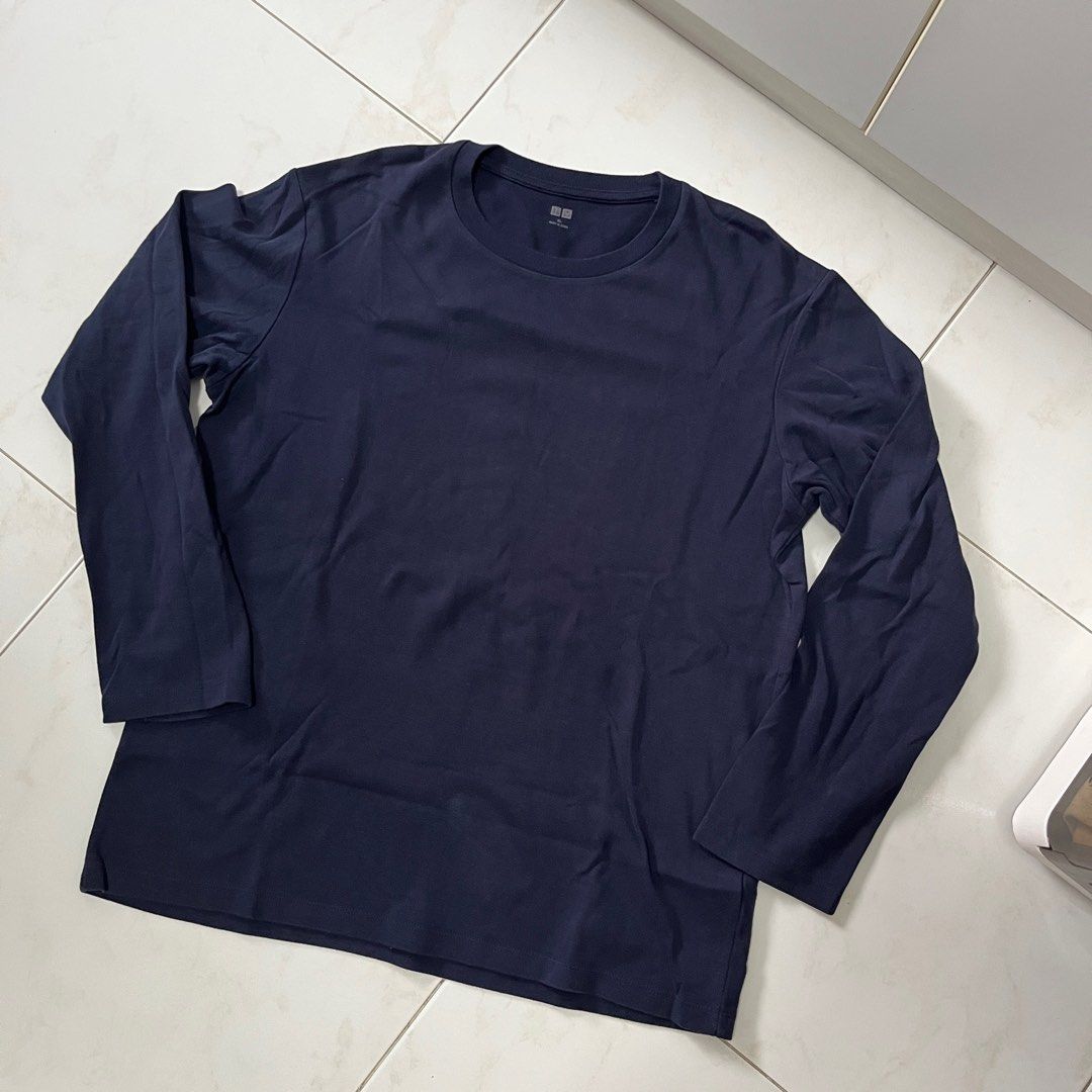 Uniqlo navy blue long sleeve tee (Category: Tshirts & Polo Shirts) located in Singapore. Submitted by comfyclub (Listing ID 1373704686, Image 2). Description: 📌 ITEM INFO 📌 • size tagged L, 22x27” • i think this is supima cotton, it’s a bit midweight. They don’t sell this in UQ anymore • no tears or pinholes, minimal pilling. • rfs: decluttering wardrobe 📦 FREE MAILING with tracking number 🧍 meetups only at my convi / extra charges to deliver