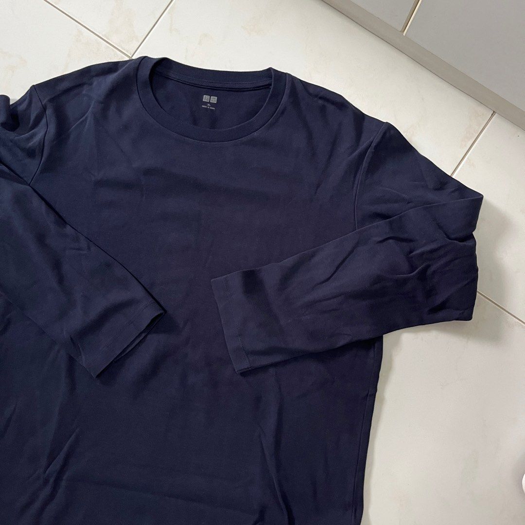 Uniqlo navy blue long sleeve tee (Category: Tshirts & Polo Shirts) located in Singapore. Submitted by comfyclub (Listing ID 1373704686, Image 1). Description: 📌 ITEM INFO 📌 • size tagged L, 22x27” • i think this is supima cotton, it’s a bit midweight. They don’t sell this in UQ anymore • no tears or pinholes, minimal pilling. • rfs: decluttering wardrobe 📦 FREE MAILING with tracking number 🧍 meetups only at my convi / extra charges to deliver