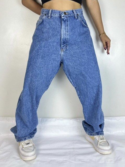Wrangler Vintage Denim Jeans (Category: Jeans) located in Pasig City. Submitted by lovendletter (Listing ID 1357010790, Image 1). Description: • hard blue denim • vintage, thrifted, unwashed • size on tag (credits to the owner for the 1st photo) dm for more details!.