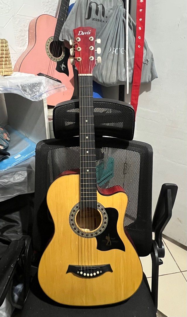DAVIS ACOUSTIC GUITAR (Category: Musical Instruments) located in Makati City. Submitted by ilayy (Listing ID 1373862130, Image 1). Description: GOOD AS NEW bag included negotiable just name your price ISSUE needs a string change.