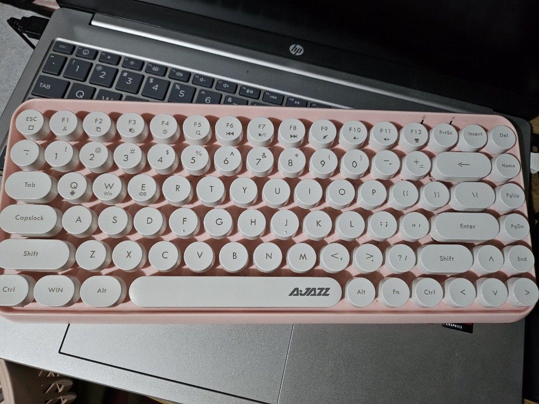 Ajazz 308i Pink Wireless Keyboard (Category: Computer Keyboard) located in Quezon City. Submitted by benpiko (Listing ID 1373869688, Image 1). Description: Ajazz 308i pink, in great condition! I used it with a cover so the keys are still in good condition. Used this with my laptop and ipad. Inclusions: keyboard only (in box) For shipping only via Lalamove and Grab Express, no meet-ups. Please send payment first before booking a delivery. Thank yo